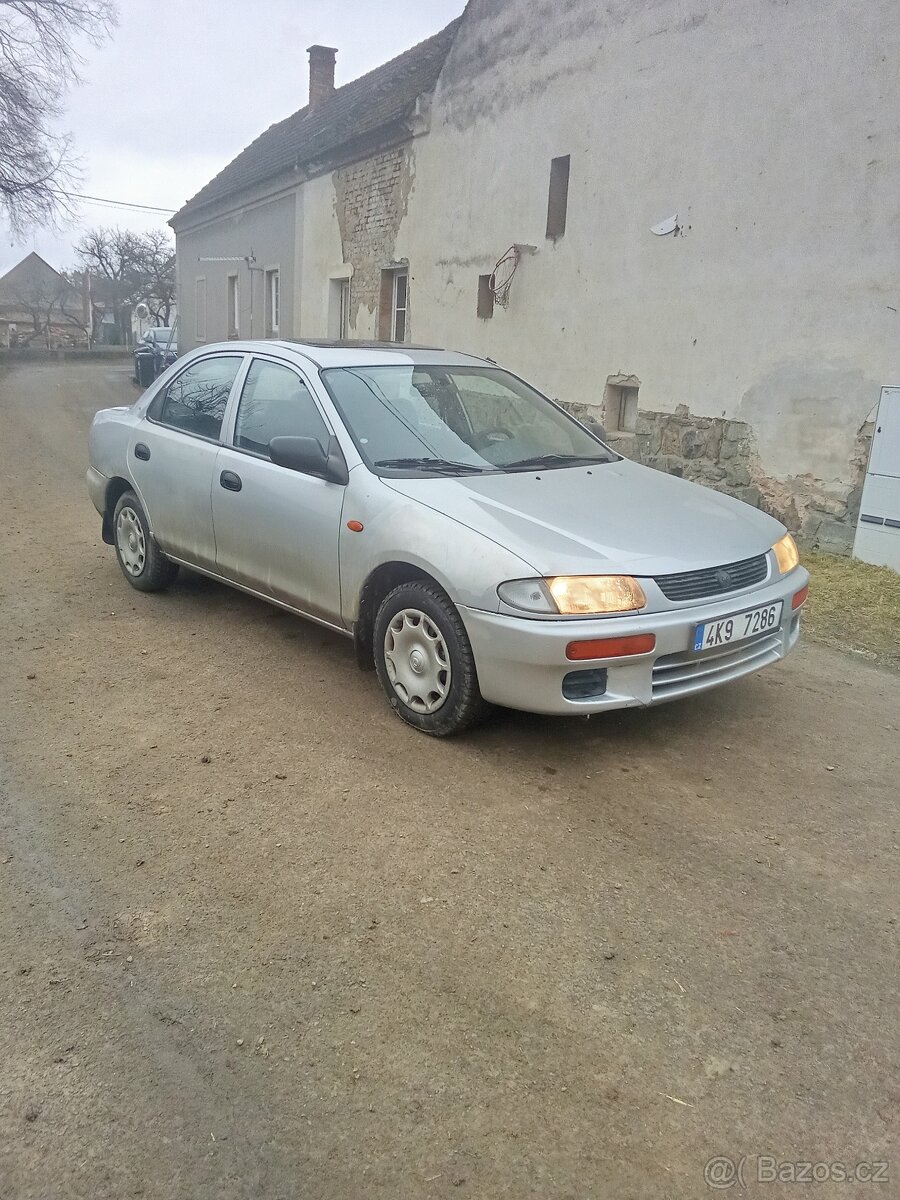 Mazda 323 - 4