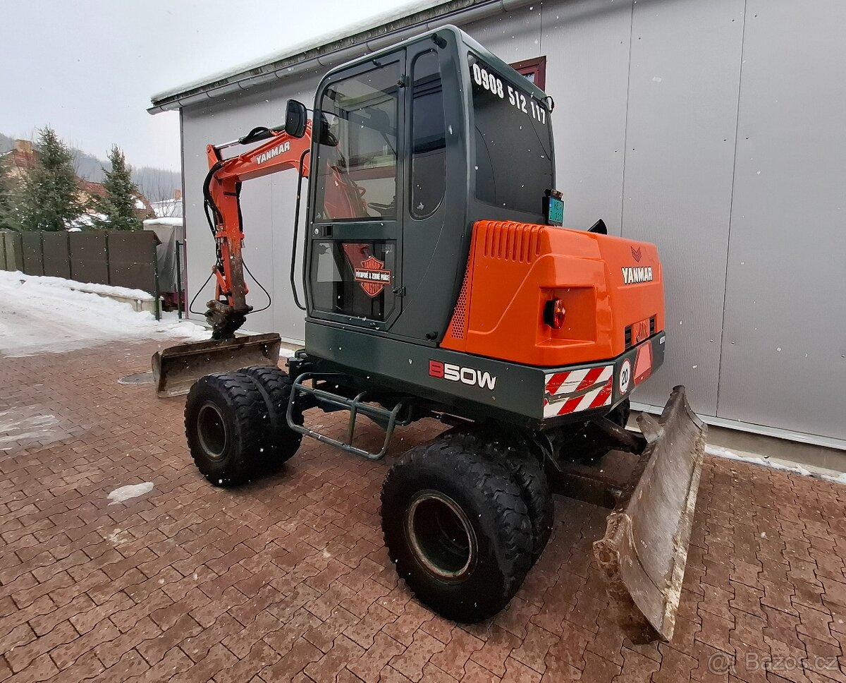 Prodám kolový bagr Yanmar B50W - 4