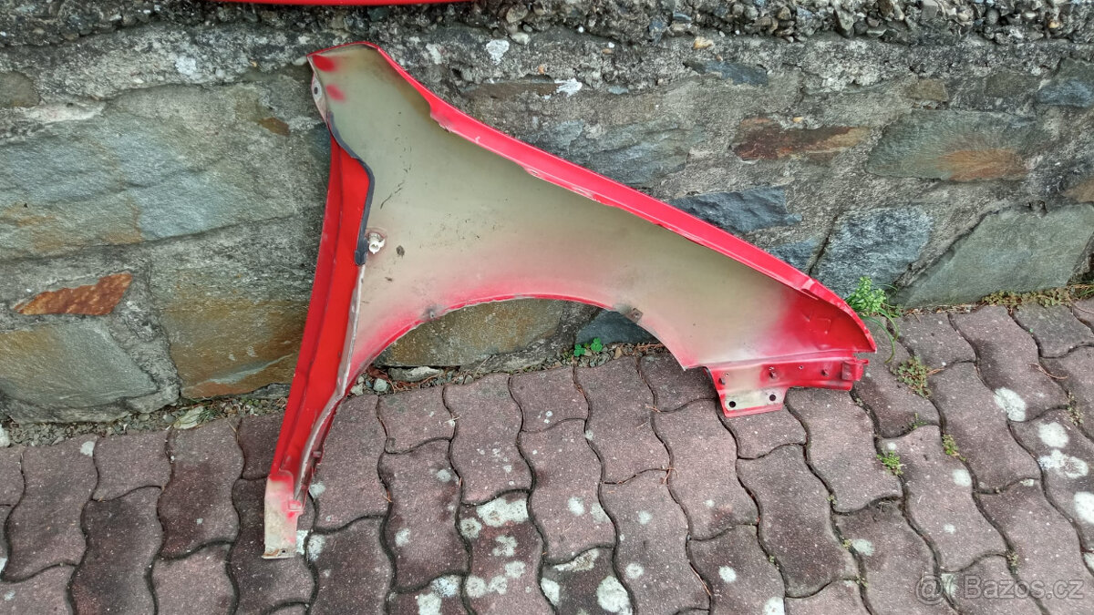 Levý přední blatník Fabia 1 - 4
