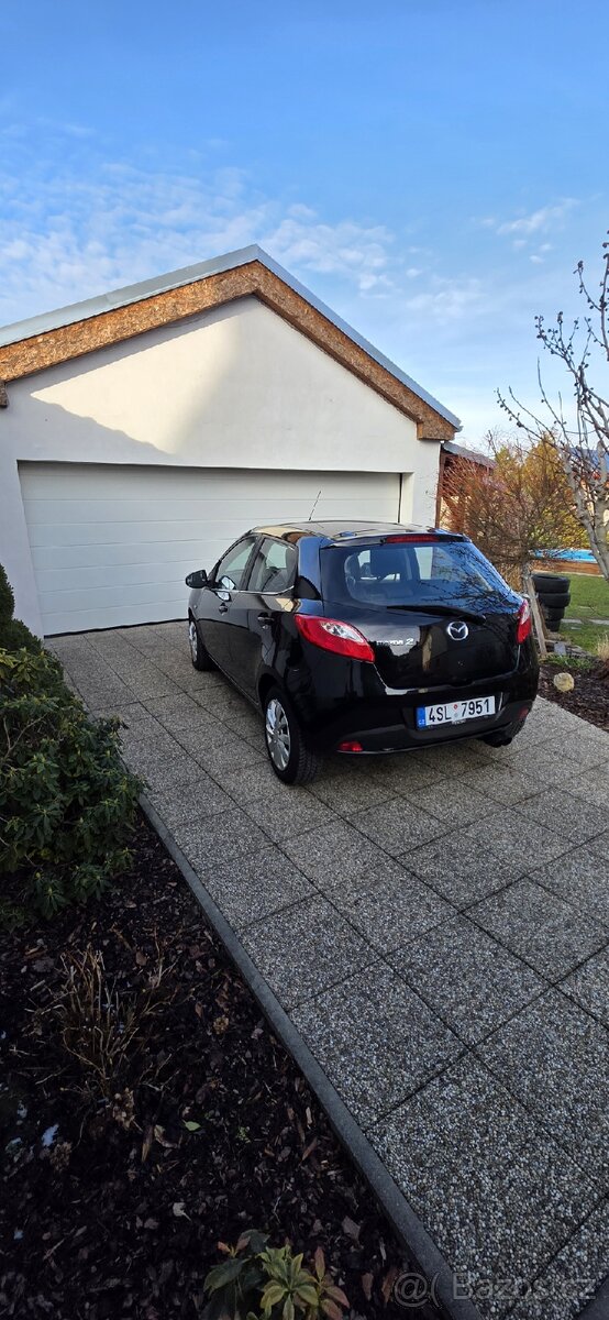Mazda 2,1,3 63 kw - 4