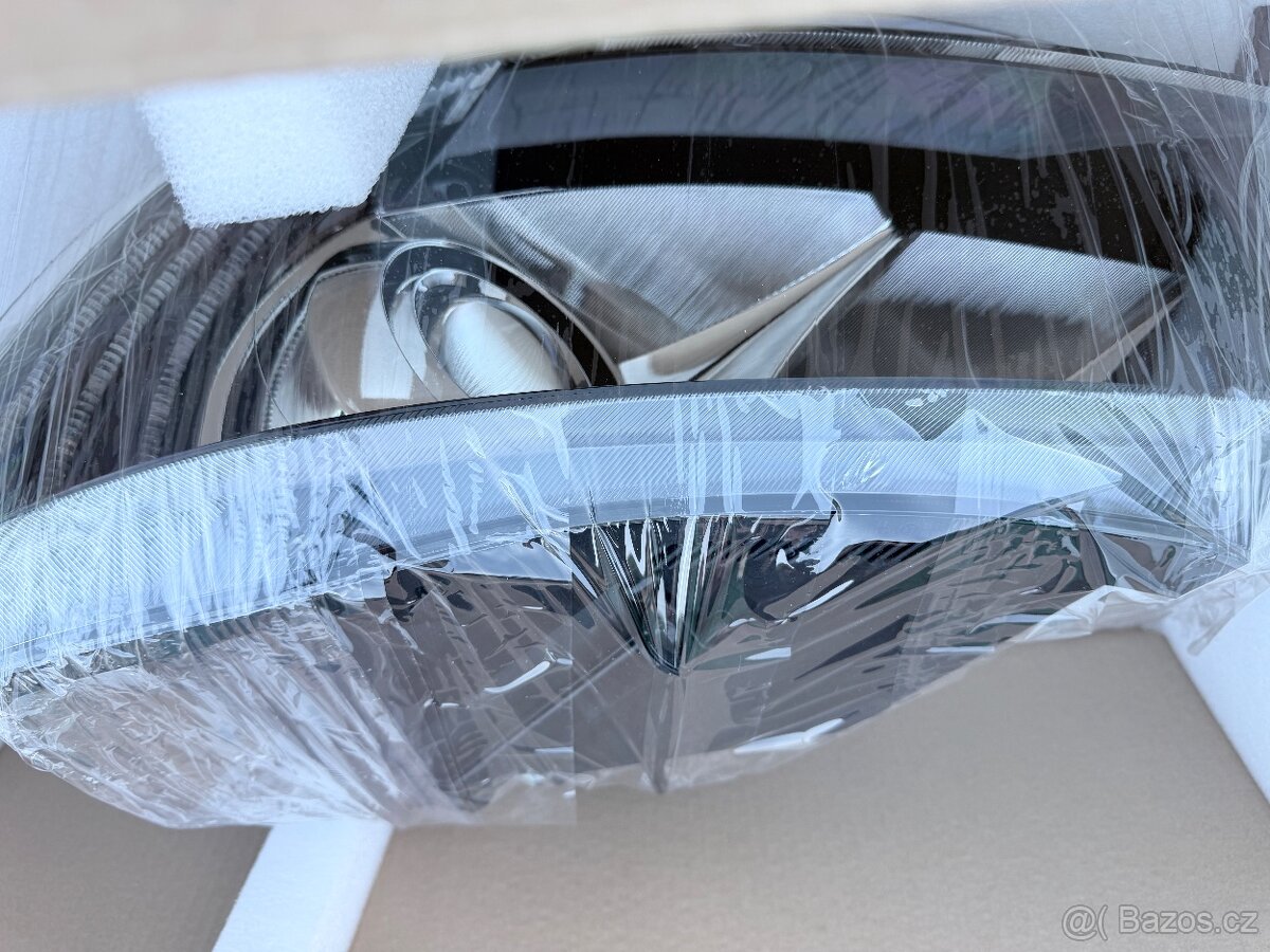 Světlomet HELLA 1ZS 011 314-331 - Škoda Superb 2 - 4