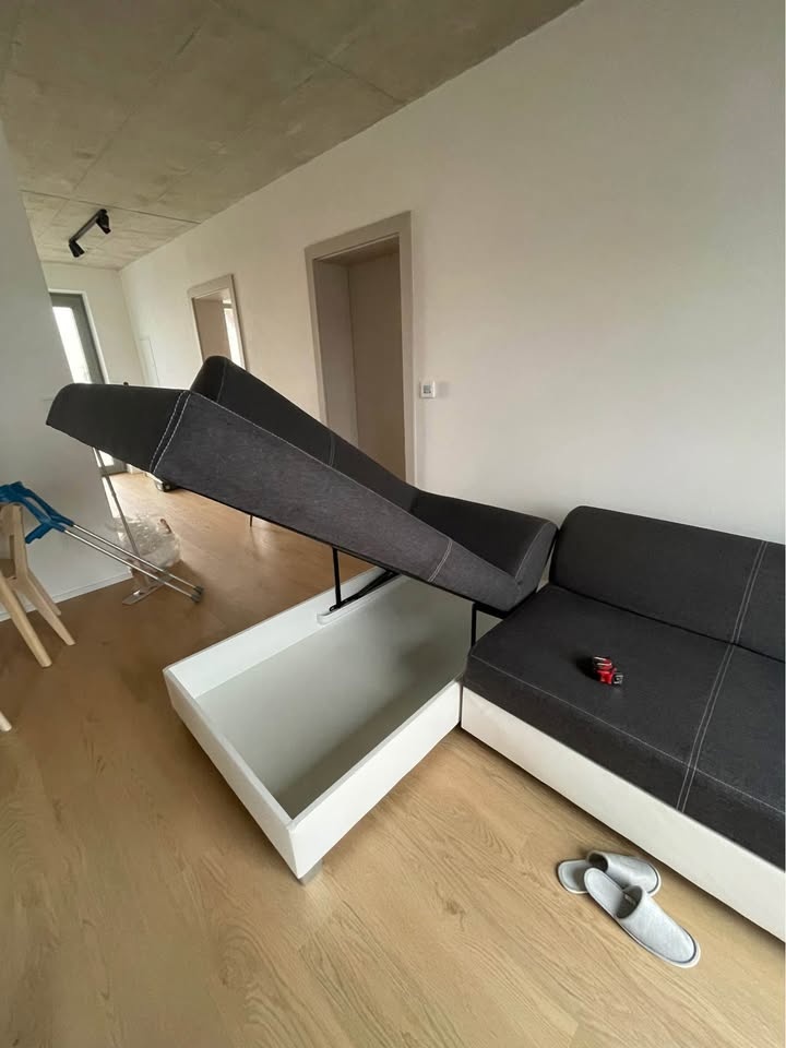 Rohová sedačka/pohovka s úložným prostorem a rozkladem na lů - 4