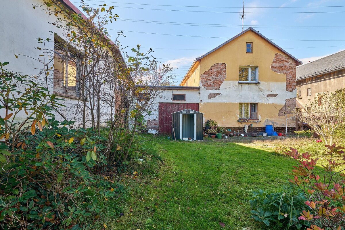 Prodej domu se 2 bytovými jednotkami, garážemi a dílnami - 4