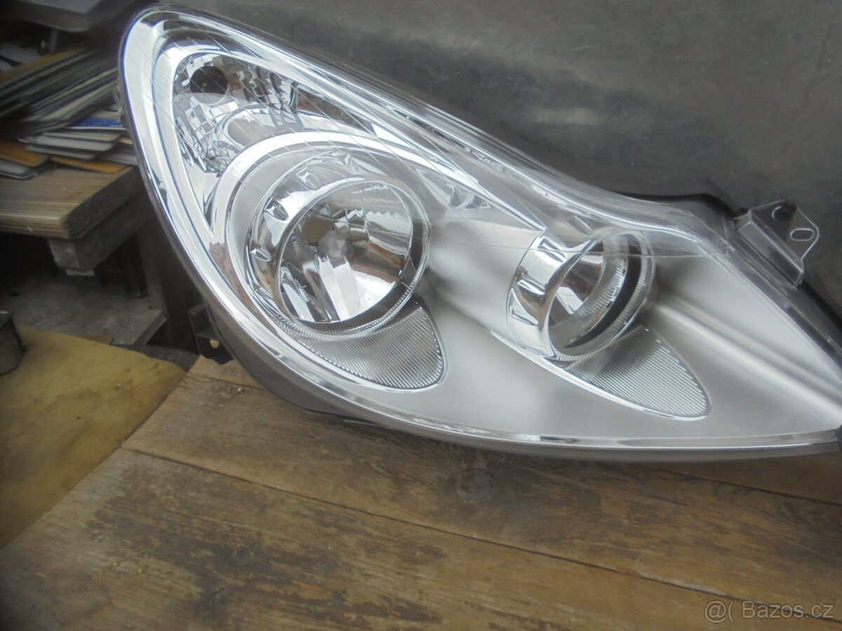OPEL CORSA D - PŘEDNÍ SVĚTLA H7 , H1 - 4