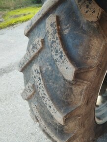 New Holland TL 100A. - 4