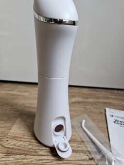 PRODÁM MÁLO POUŽITOU ÚSTNÍ SPRCHU OPTISMILE V ZÁRUCE - 4