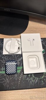 Apple AirPods 2019 - 4