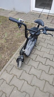 dětskou elektrokoloběžku 250 V. - 4