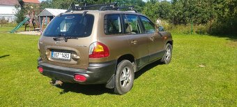 Hyundai Santa Fe 2,4i 4x4 - 4