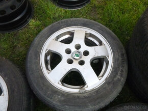 4x alu disky škoda (5x100) letní pneu 185/60 r14 - 4