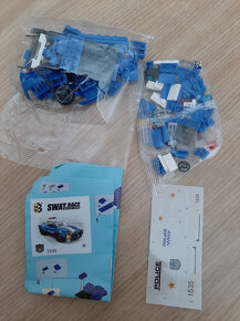 Stavebnice typu Lego, plyšáci, puzzle, panenky, nářadí - 4