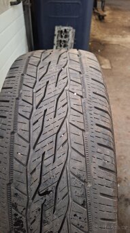 255/60R18 - 4