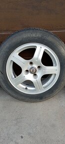 ALU DISKY 4X100 6,5JX15 H2 - 4