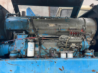 Kolový bagr 714.4 - 4