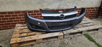 Popel Astra H, přední světla, nárazník - 4