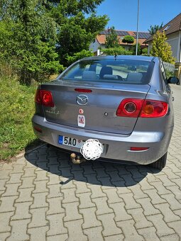Mazda 3 sedan 1.6 77 kW - 4