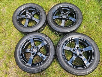 Kompletní letní Alu kola DEZENT - 205/55 R16 - 5x112 - 4