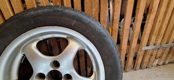 Alu kola Alutec 15" 4x100 7J ET37 střed 64.1 mm - 4