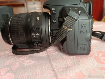 Prodám Nikon 3100+obj. 18-55 - 4