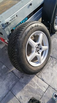 Celoroční pneu s disky 5x112 .215/65 r16 - 4