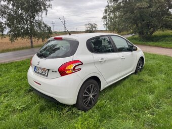 Prodam Peugeot 208 2013 najeto 60t km 1.0 benzin - 4