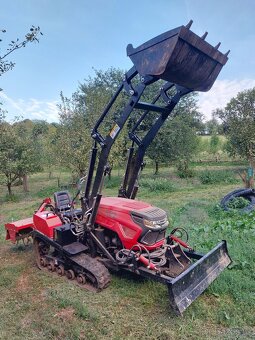 Nový multifunkční pásový traktor - 4