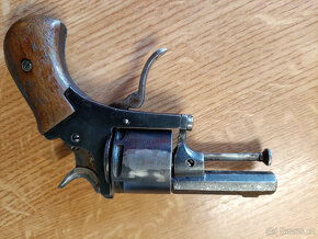 Revolver 320 corto dor. 1890 - 4