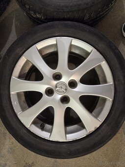 Alu kola Mazda 4x100 185/55 R15 - 4