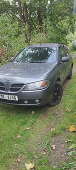 Nissan almera 1,5 - 4