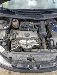 Peugeot 206 1,4i - 4