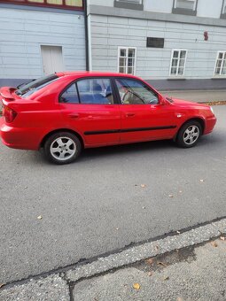 Hyundai acent 1.4 rok 2004 - 4