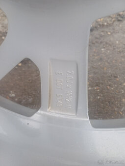 Zimni pneu s alu  235/55/18  -  5x112 - 4