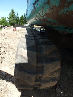 MINI BAGR KOMATSU - 4