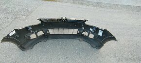 Přední nárazník VW TOURAN 1T0 807 221 - 4