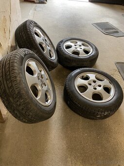 Kompletní sada kol Opel Astra – lité disky + letní Pirelli - 4