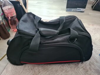 Středně velký látkový kufr, kolečka a madlo - 4