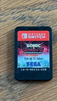 Nintendo Switch OLED + 7 her - 4