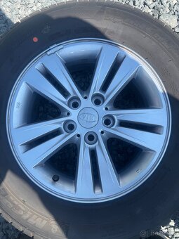 Letní Alu sada Kia Sportage 215/70 R16, 5x114,3 - 4