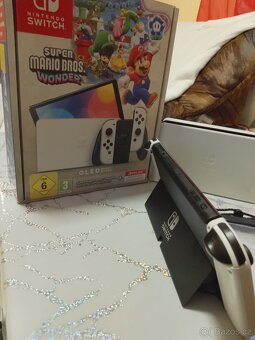 NINTENDO SWITCH OLED - 4