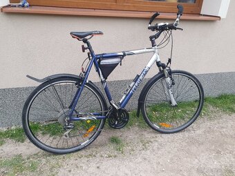 Pánské silniční kolo.TREK - 4