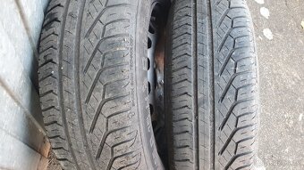 15" VW Škoda 5x112 + kryty kol VW - 4