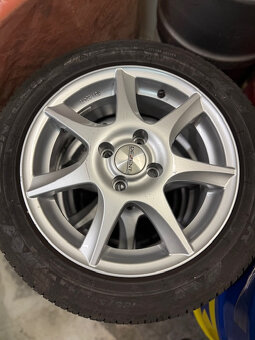 Hliníkové disky VW 4x100 pneu Cooper 185/55 R15 - 4