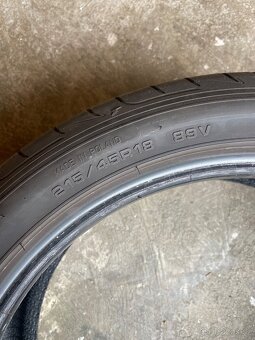 Prodám 4 ks letni pneu Good year 215/45 R18 89V - 4