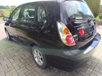 Prodám Suzuki Liana 1,6i , 4x4 , dovoz - 4