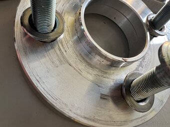 PODLOŽKY: (4x100) šířka 15 a 20mm s náběhem st. kol 59,1mm - 4