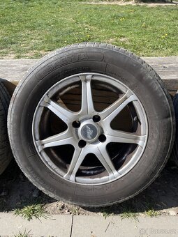 prodám 15" alu litá kola na Citroen C4 2005+letní pneu - 4
