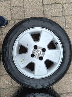 Alu disky+pneu na Opel Astra - 4