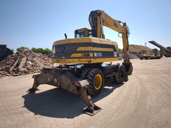 Kolové rypadlo CAT M315 - 4