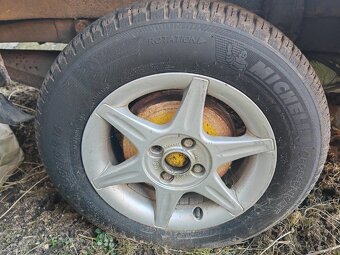Pěkné celoroční Michelin 175/70/R14 na AL kolech - 4