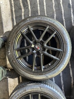 Letni kola VW Škoda 215/55 R17 5x112 ET52 - 4